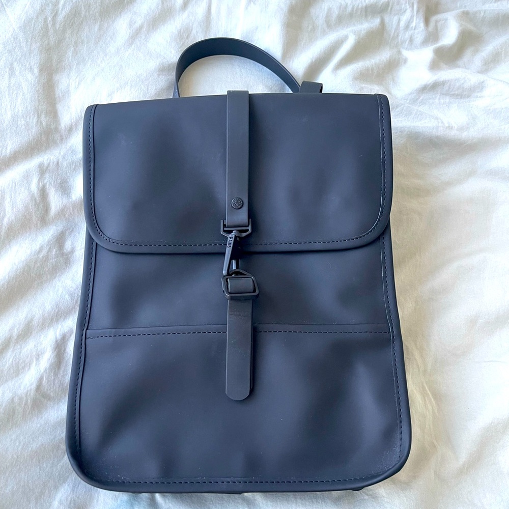 Rains Backpack micro in black, used three times. Fits 13” laptop